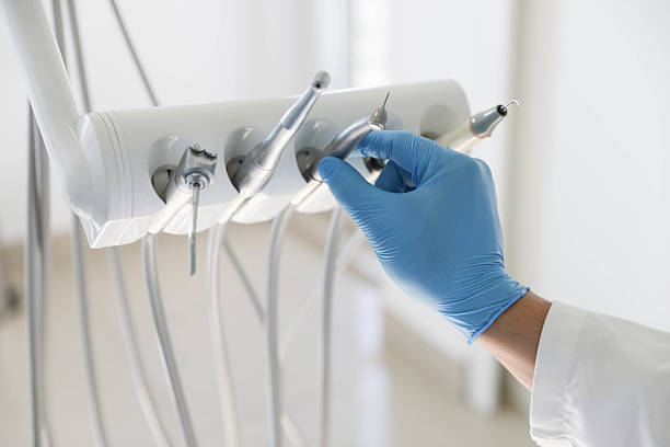 Professional Tooth Extraction technician working in Danville, IA